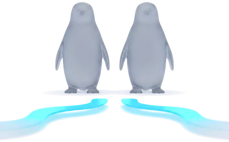 Two unlit glass penguins, with the light stopping the same distance short of each of them.